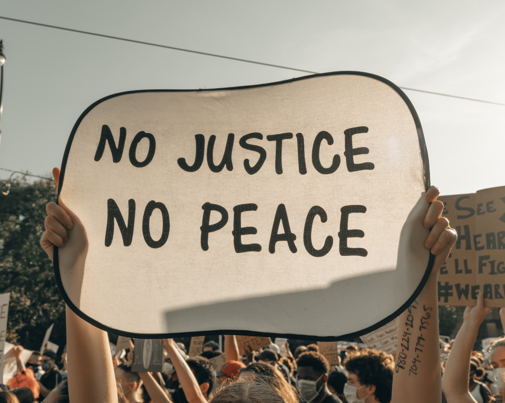 No Justice, No Peace sign